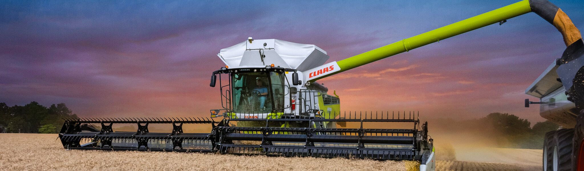 Claas-lexion-8700-sunset-front-unload.jpg